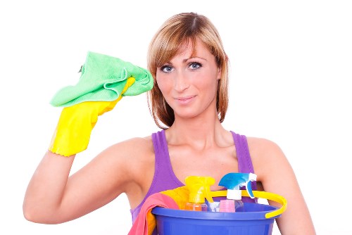 Cleaner assessing carpet cleaning safety procedures before starting work
