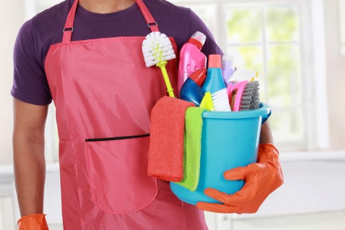 Carpet cleaning team preparing safely in Colliers Wood