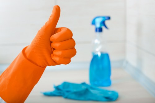 Professional cleaner reviewing site conditions during carpet cleaning